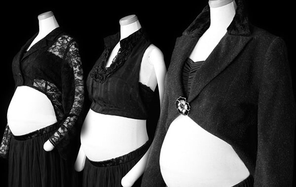 Maternity photo sample in formal dress -- covering upper arms elegantly with a shawl